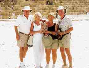 Dr. James Kerr, June Kerr, Brenda Chantler and Dr. Murray Chantler at the base of the largest pyramid in Cairo, Egypt.