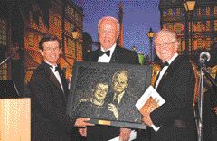 Dentistry Canada Fund president Dr. Doug Smith (left) and CDA president Dr. George Sweetnam (middle) honour Dr. Ralph Crawford during CDA's gala soiree in Montreal.