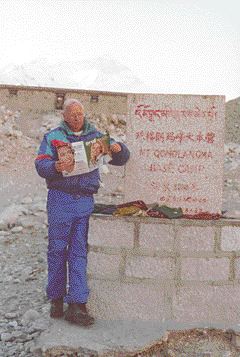 Dr. J.D. Henderson of Regina, SK, takes a breather at Mt. Everest. The Tibetans call the mountain Qomolang ma, or the Golden Mother of the Universe and at its base, the world's highest monastery.