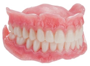 FIGURE 17. Initial insertion of maxillary and mandibular complete dentures by third appointment.