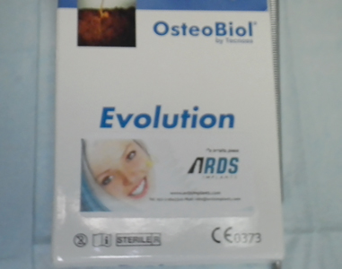 The site was then covered with an Evolution membrane (OsteoBiol by Tecnoss).