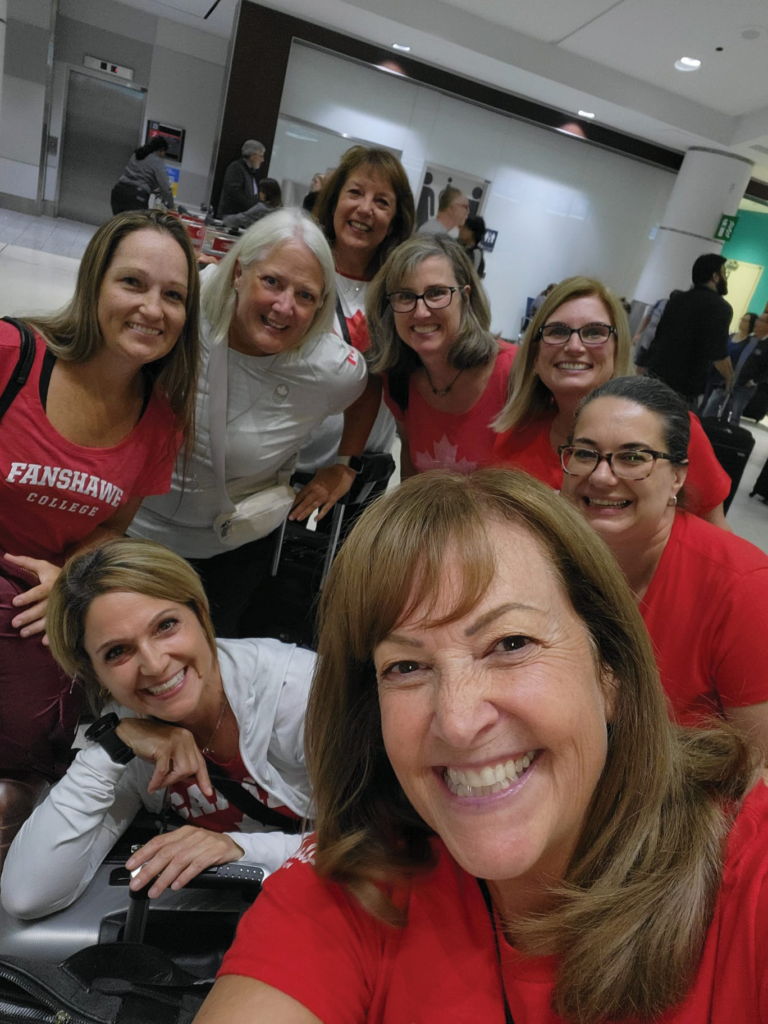  Team Canada hygienists at the Toronto airport on the way to Grenada. Back Row: Jeanette Szmiett, Shelley Getty, Cindy MacKinnon, Kelly Turner, Kim LeRoy, Natasha Kellett. Front Row: Carolyn Weiss and Bev Woods