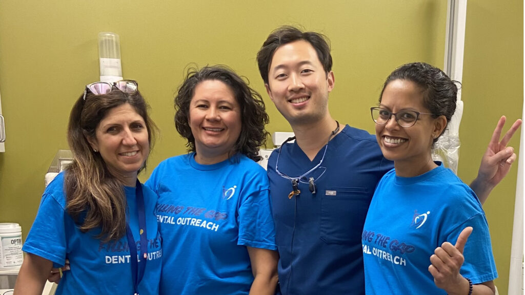 Caption: Dr. Sanjukta Mohanta poses with staff, including Dr. Hyun Nam (second from the right), a 2021 graduate, at the Filling the Gap location in Rexdale on July 13, 2024. The staff are volunteering their time to provide essential dental services to vulnerable populations. (Photo supplied)