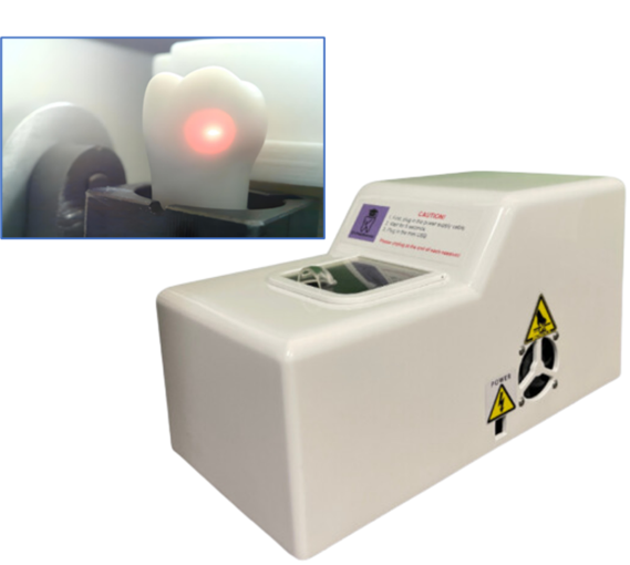 The PrepScanner unit in action, showcasing a dental prep being scanned using an advanced laser sensing system. The system captures precise measurements and generates detailed data for assessing the quality of the preparation with micrometer-level accuracy.