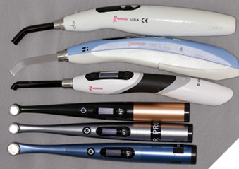 Six examples of ‘Woodpecker’ LED curing lights. The X-Star at the bottom of the image is the latest version.