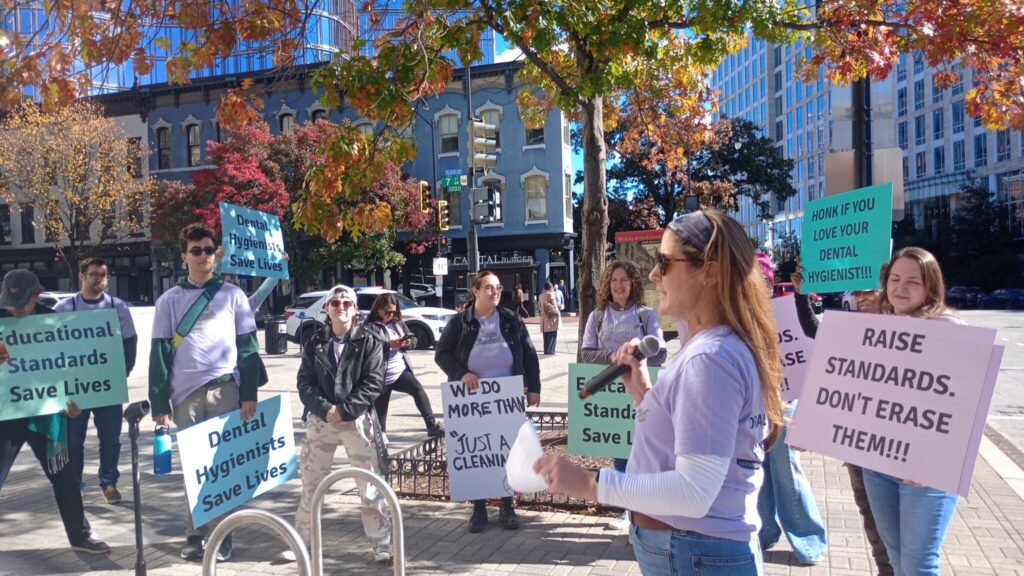 A speaker addresses demonstrators during the Oral Health Awareness Project’s Oct. 25 rally in Washington, D.C. (Photo supplied)