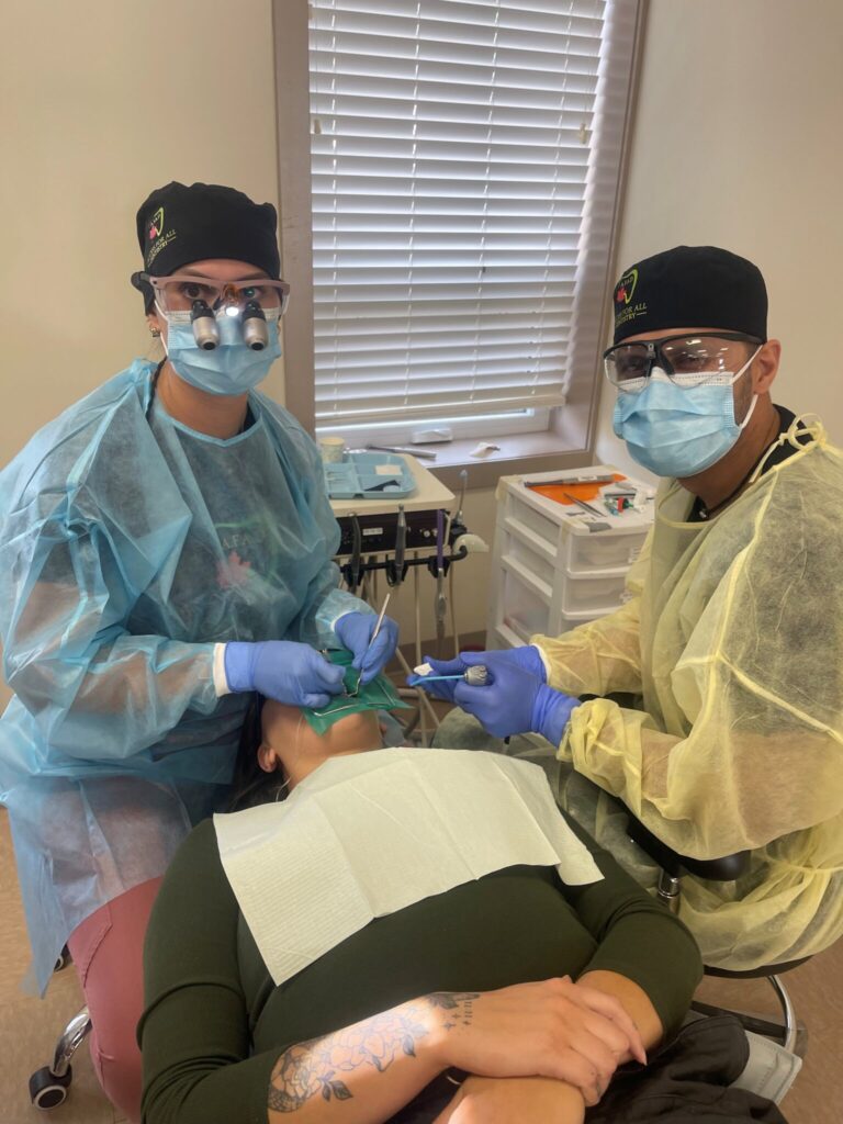 Students provide dental care to a member of a Métis community. (Photo supplied)
