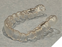 Broken clear retainer.