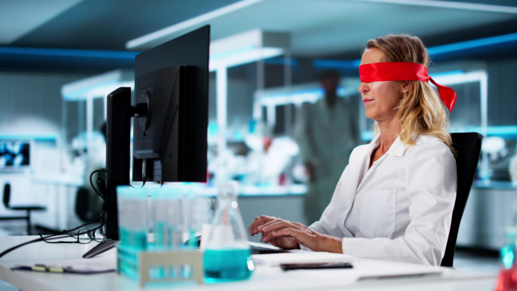 Blindfolded Lab Executive Confused Working At Computer
